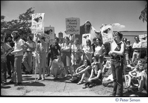 Protesters at a Mobilization for Survival antinuclear demonstration near Draper Laboratory, MIT, carrying signs opposing the MX missile and nuclear power