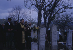 Village priest officiates at Šumadija funeral