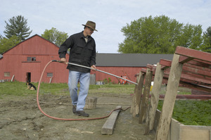 Lazy Acres Farm (Zuchowski Farm): Allan Zuchowski watering cold frames