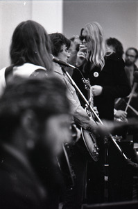 Duane Allman's funeral: Gregg Allman smoking a cigarette, with Dr. John in the foreground, Barry Oakley (l) and Dickey Betts (c)