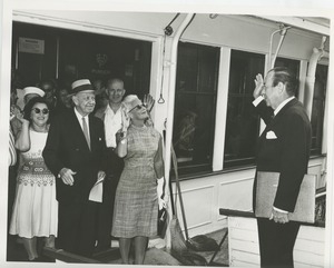 Jeremiah Milbank, Sr. and Mrs. H. Lawrence Bogert, Jr. waving to Mayor Robert F. Wagner