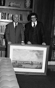 Mayor Kevin White posing with unidentified man and painting