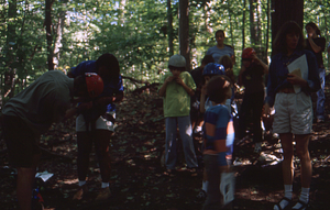 Hopkins Forest Fall Festival, 1999. 11.Kids buckle harneses at canopy walkway.
