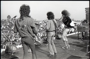 Hollywood Speedway Rock Festival: Wet Willie in performance, (l. to r.) Jack Hall (bass), Rick Hirsch (guitar), and Jimmy Hall (vocals) wearing cape