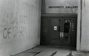 Graffiti by the entrance to the University Gallery, UMass Amherst, reading 'CIA out of UMass'