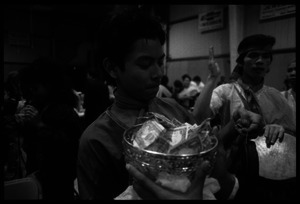 Cambodian New Year's celebration: drummers and pot of money