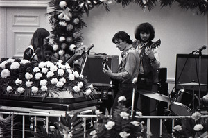 Duane Allman's funeral: Allman Brothers Band performing, from left, Barry Oakley, Jaimoe, Delaney Bramlett, and Dickey Betts, with Allman's casket in the foreground