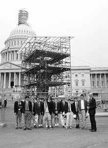 Congressman John W. Olver (right) and visitors: the top of the United States Capitol building and nearby statue are covered in scaffolding