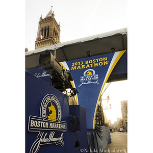 Camera and banners at the 2013 Boston Marathon finish line