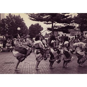 Women performing a folk dance through the plaza at Festival Betances.