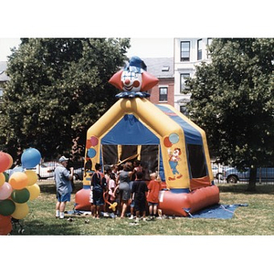 Children waiting to enter a bounce house at Festival Betances.