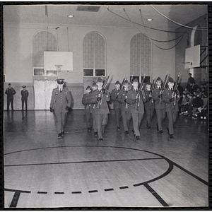 Boston University Company B-12 cadets march with their rifles at the Charles Hayden Clubhouse on Physical Fitness Day