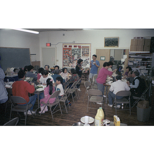 Members eat at tables during an Association dinner