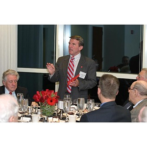 Retired General Richard Neal gestures while speaking at the Veterans Memorial dinner