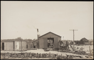 Workmen labor on the railroad