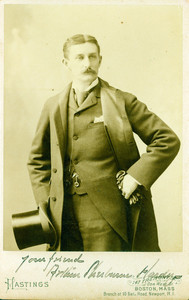 Three-quarter studio portrait of Arthur Sherburne Hardy, facing front, holding a top hat and gloves, location unknown