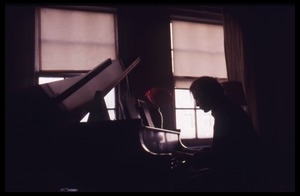 Stephen Stills playing piano in Judy Collins's apartment
