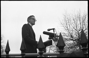 Priest addressing the crowd from the dais during a civil rights demonstration in front of the White House on Lafayette Square