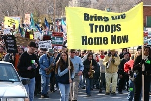 Beginning of the march, led by women holding a banner reading 'Bring the troops home now': rally and march against the Iraq War