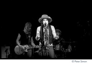 Bob Dylan performing at the Harvard Square Theater, Cambridge, with the Rolling Thunder Revue