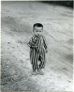 Young boy wearing stripes