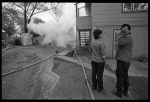 Man in anguish after learning that his garage was gutted by fire, and the family's cat was trapped inside