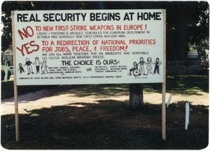 ' Real security begins at home': antinuclear weapons sign posted on Main Street, Northampton