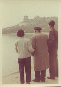 W. E. B. Du Bois and two unidentified assistants look at the Tower of Buddhist Incense in Beijing, China