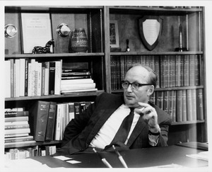 Robert C. Wood at his desk