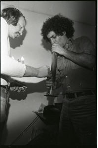 Abbie Hoffman: Hoffman (right) smoking marijuana in a bong at WBCN studio