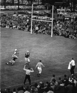 Successful football catch, 1957