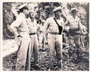 General MacArthur inspects battlefield, while guarded by my father's platoon