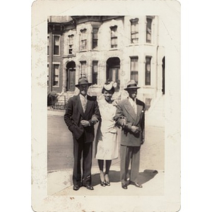 Inez Irving Hunter poses between two men