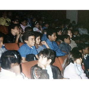 Audience of school children watching a performance sponsored by Inquilinos Boricuas en Acción's Areyto.