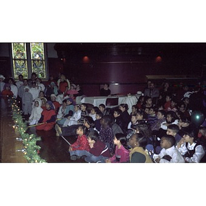 Children in the audience at the Jorge Hernandez Cultural Center during a celebration of Three Kings Day.