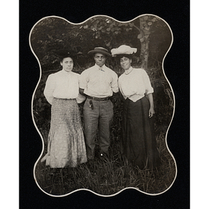 Group photograph, Charles H. Bruce with two young women