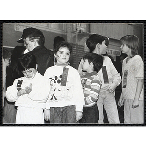 Five boys and girls wearing "DRUG FREE AND PROUD TO BE" ribbons and standing in line at a joint Charlestown Boys & Girls Club and Charlestown Against Drugs (CHAD) event