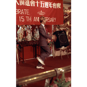 Dancer performing during the Chinese Progressive Association's 15th Anniversary Celebration