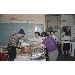 Food preparation at Chinese Progressive Association anniversary event