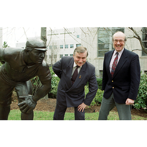 Lech Walesa and Dean Robert Lowndes pose with Cy Young statue