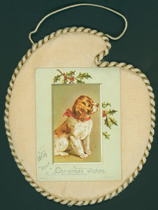 Christmas card, showing a dog and holly, undated