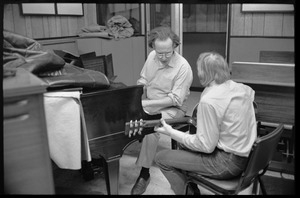 Stephen Stills with his guitar and Michael Sahl on piano at Wally Heider Studio 3 during production of the first Crosby, Stills, and Nash album