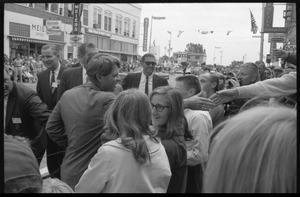 Robert F. Kennedy shaking hands in the street in Worthington, Minn., during the Turkey Day festivities