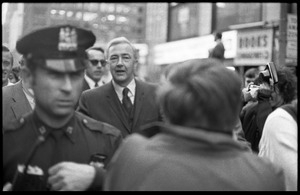 Eugene McCarthy walking through the crowd during the Vietnam Moratorium activities