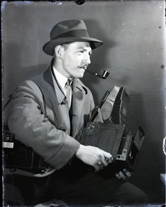 Jack Dixon, photojournalist, with his Graflex camera