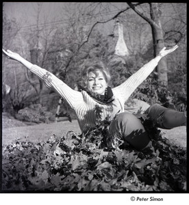 Joanna Simon throwing leaves