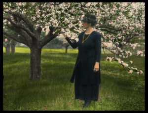 Bay Road Fruit Farm (woman near apple tree in blossom)