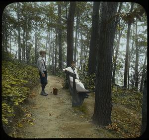 On the trail, Sugarloaf (girl on bench in woods with boy)