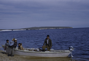 Family with fishing boat