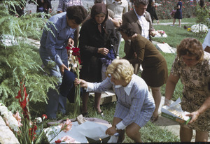Mourning at grave site